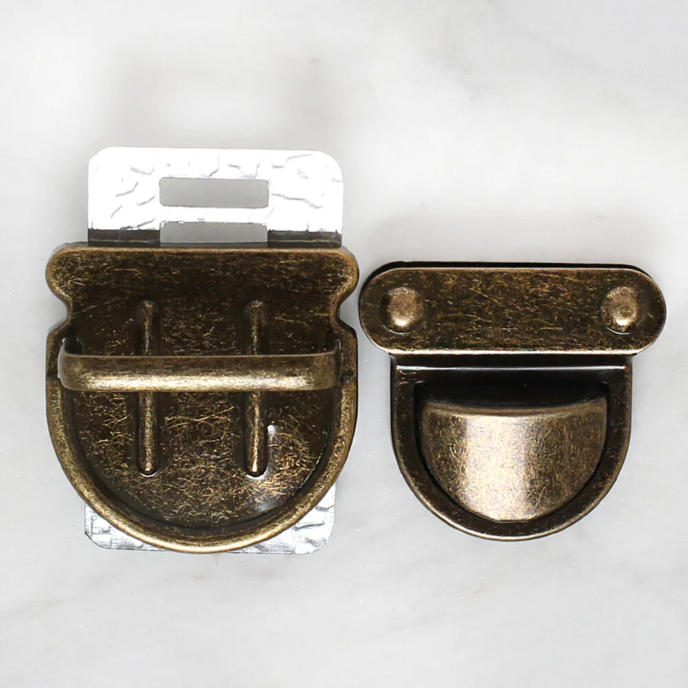 Loren Medium Size Metal Bag Tuck Lock, Antique Yellow - Image 2
